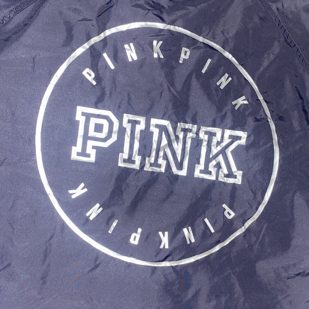 PINK button down windbreaker jacket.
